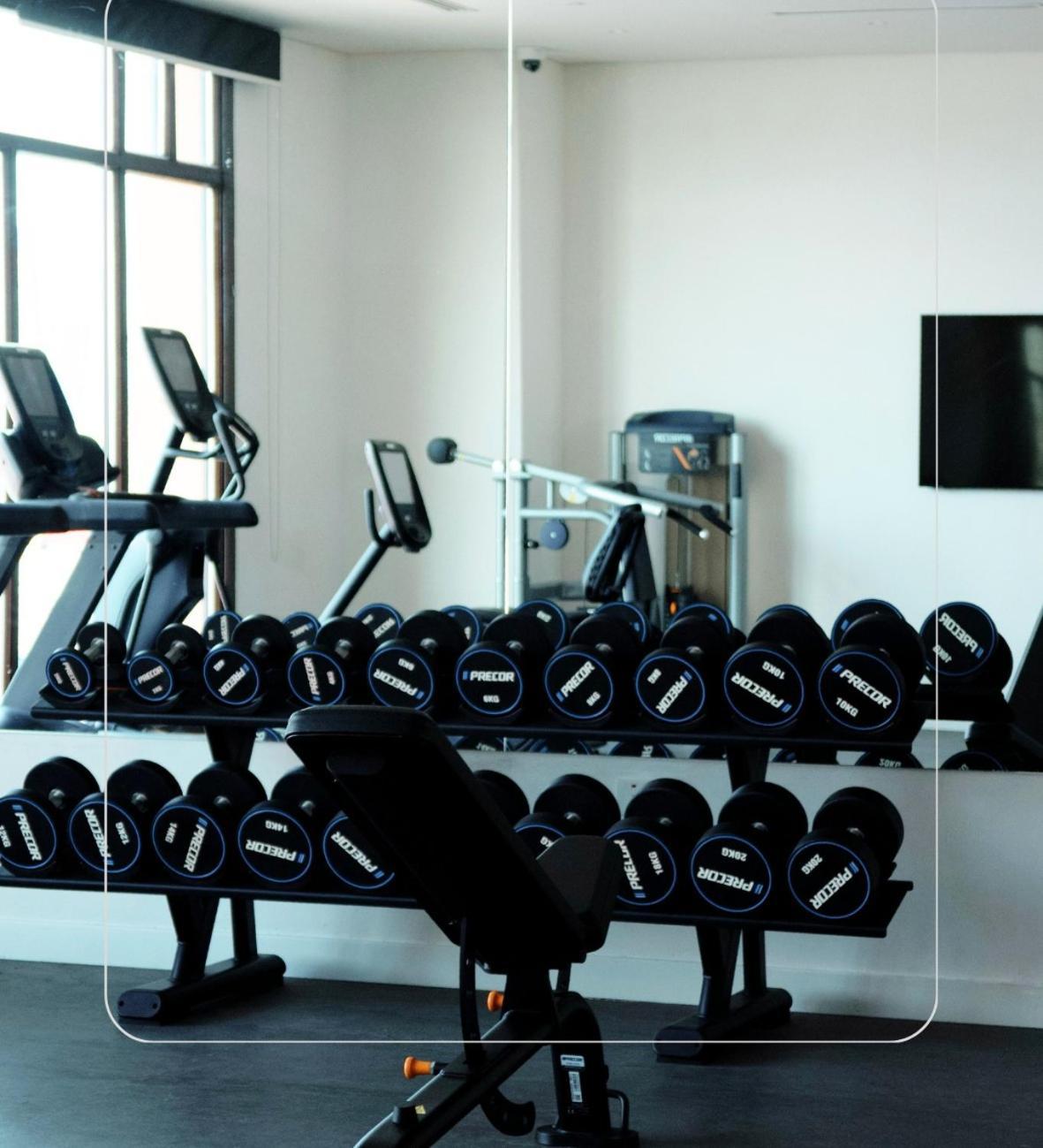 Mina Hotel And Residences By The Torch Doha Extérieur photo A set of dumbbells