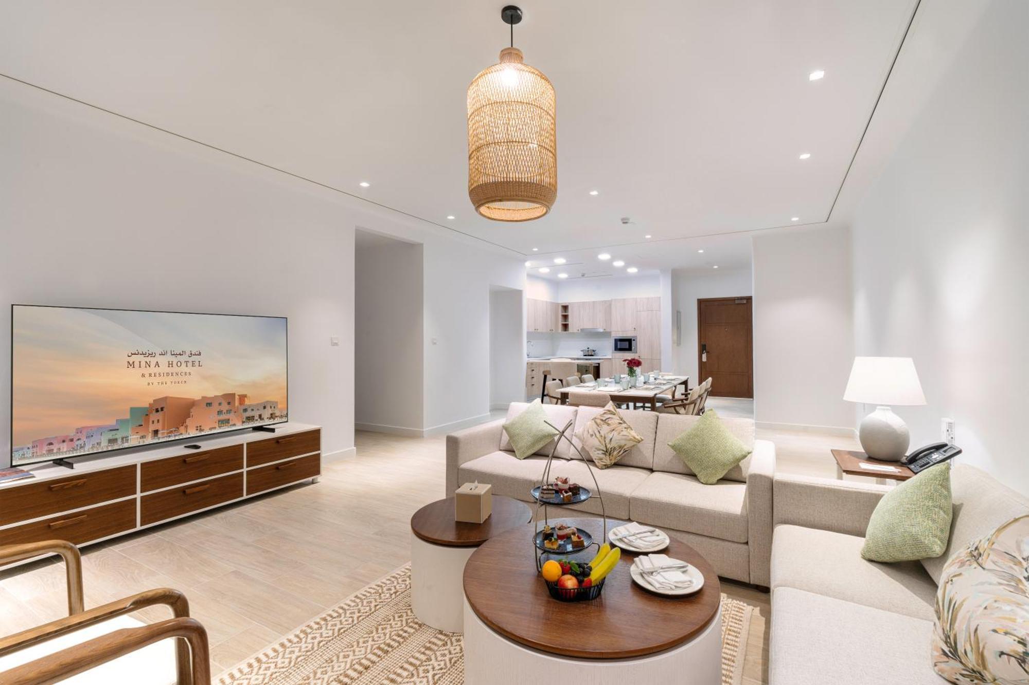 Mina Hotel And Residences By The Torch Doha Extérieur photo A living room at the Ritz-Carlton, DIFC