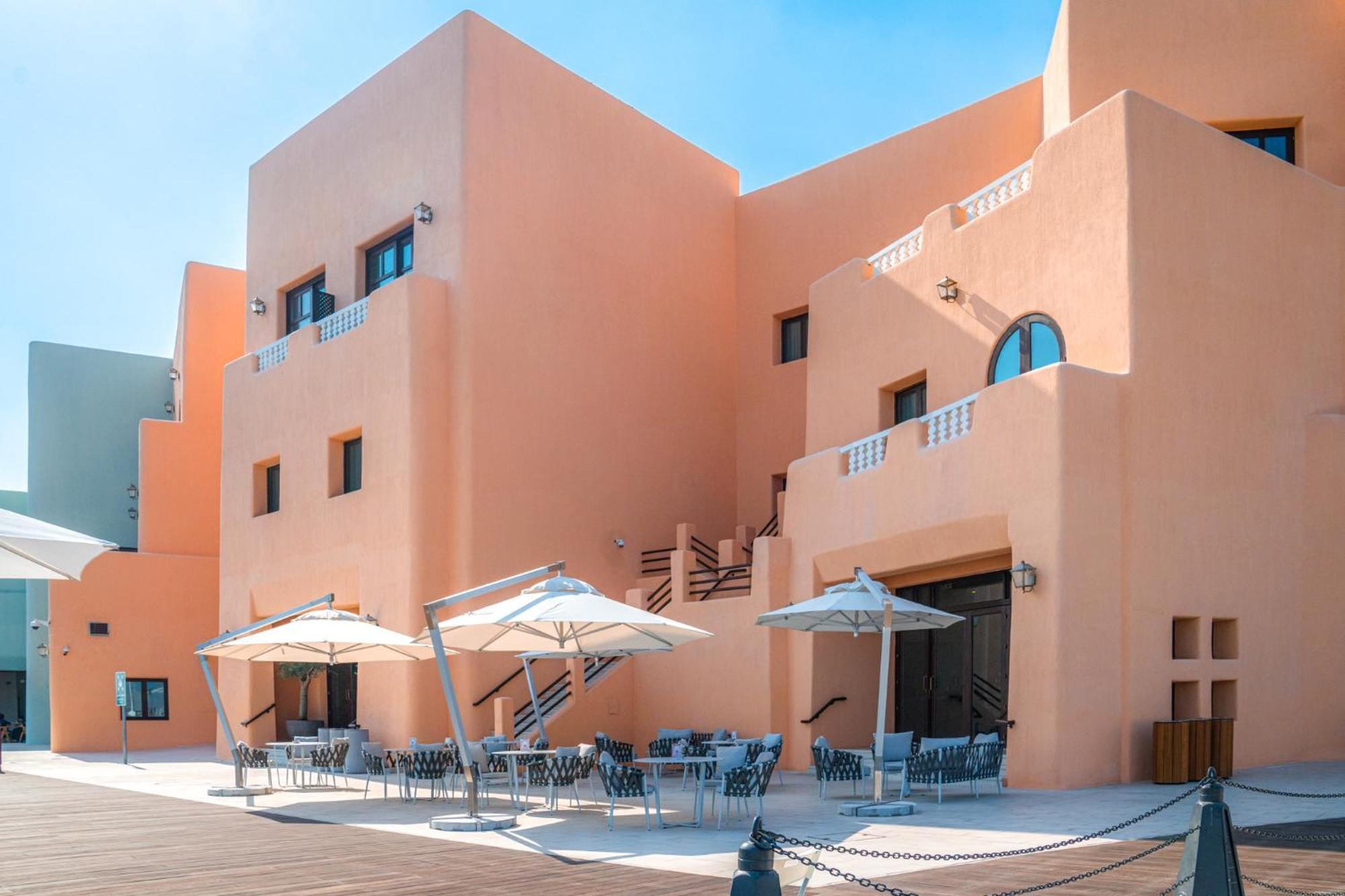 Mina Hotel And Residences By The Torch Doha Extérieur photo The hotel's main building