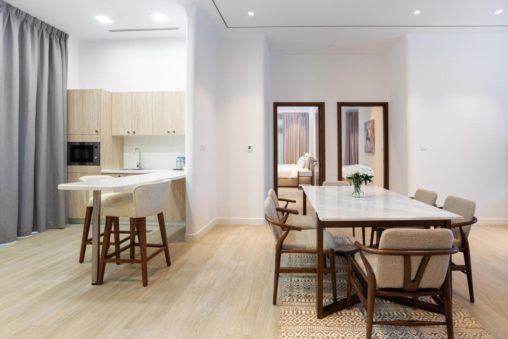 Mina Hotel And Residences By The Torch Doha Extérieur photo A typical apartment interior