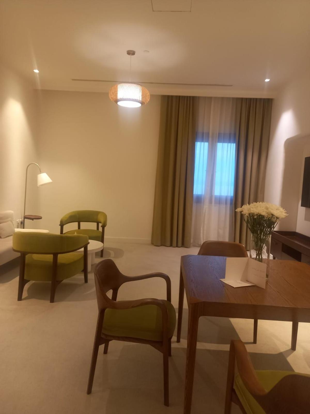 Mina Hotel And Residences By The Torch Doha Extérieur photo A room at the hotel